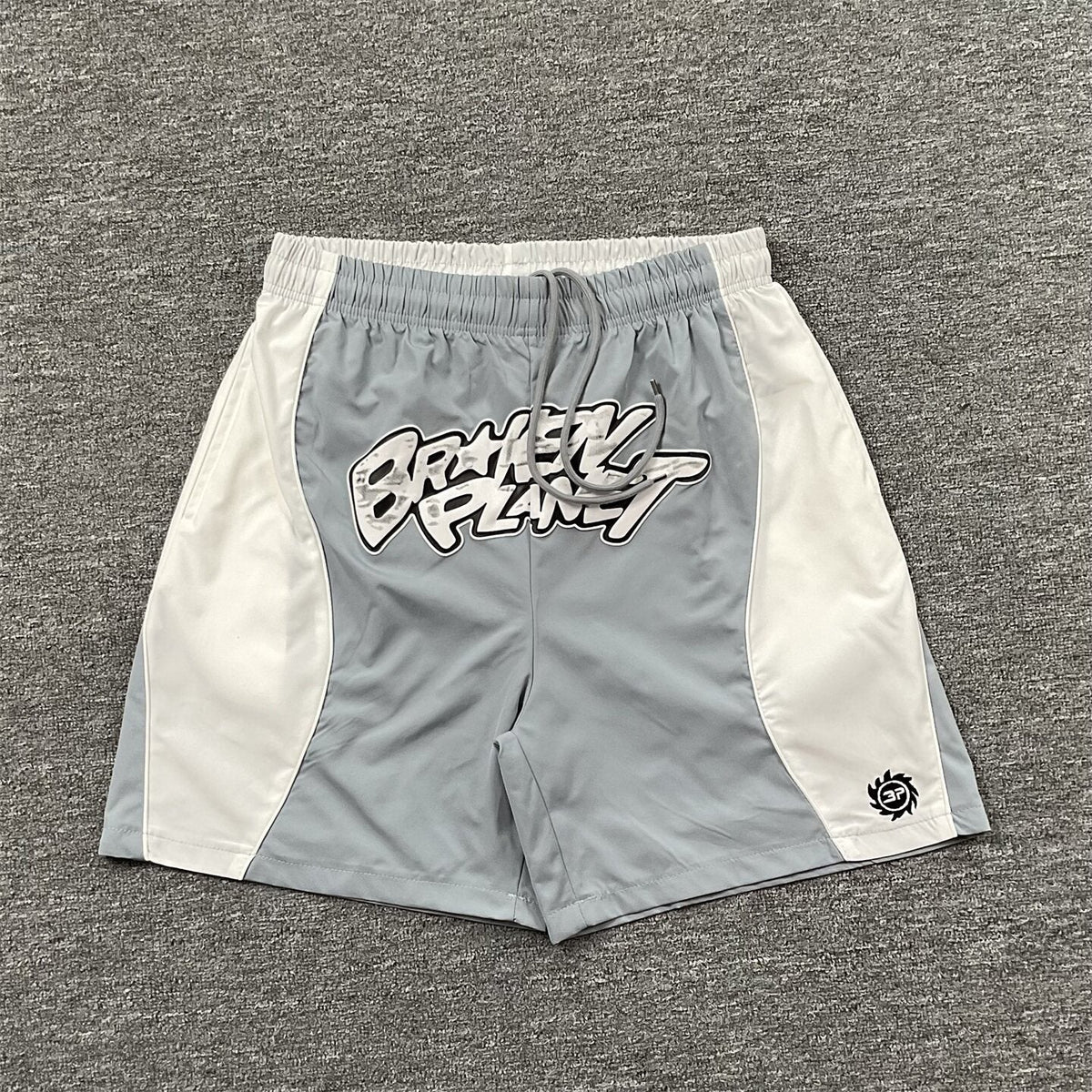 Broken Planet Letter Print Color Block Beach Shorts